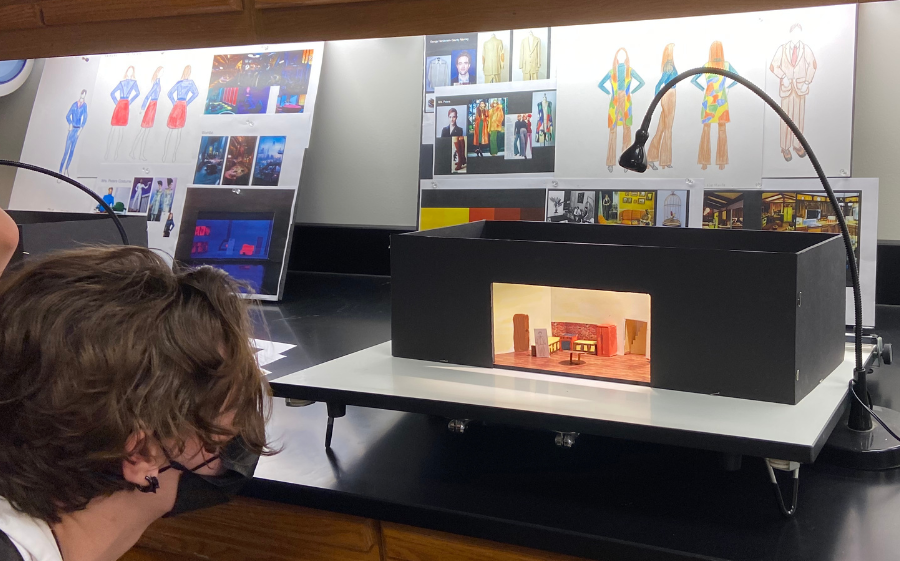 Pre-College student student studies a class project